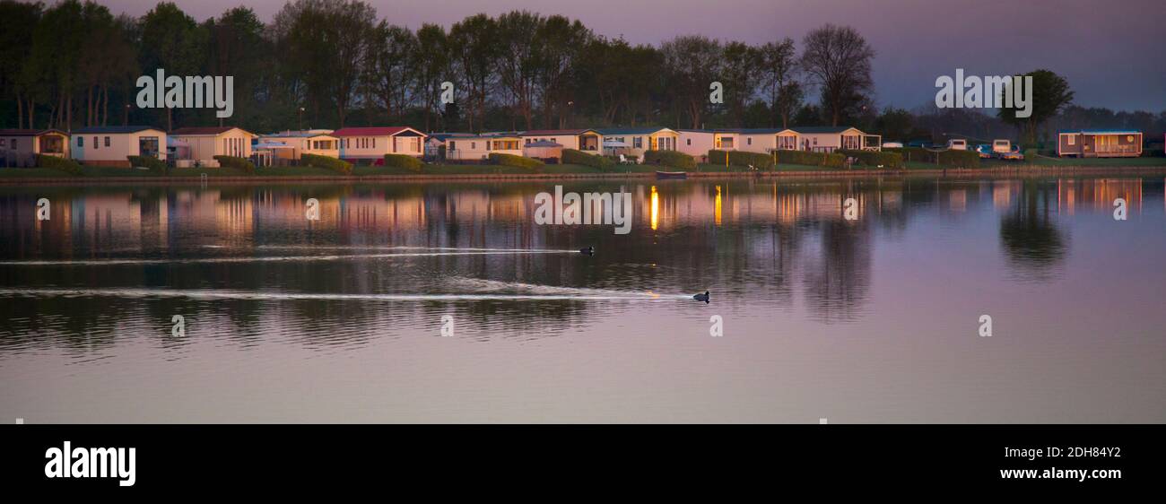 campsite at lake at sunrise, Netherlands Stock Photo