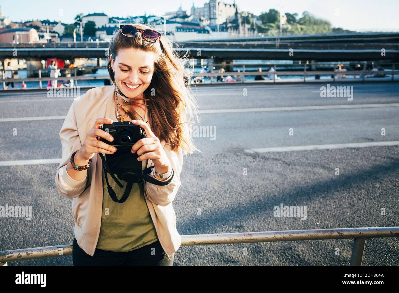 Person holding camera hi-res stock photography and images - Alamy