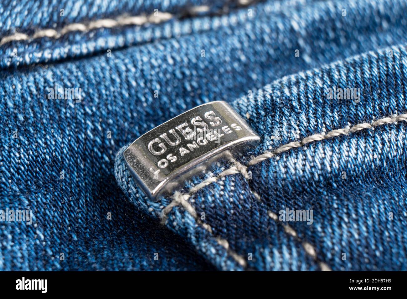 Sankt-Petersburg, Russia, December 6, 2020: Close-up of the Guess jeans logo.  Macro shot guess logo on jeans. Guess is a famous american clothing bran  Stock Photo - Alamy