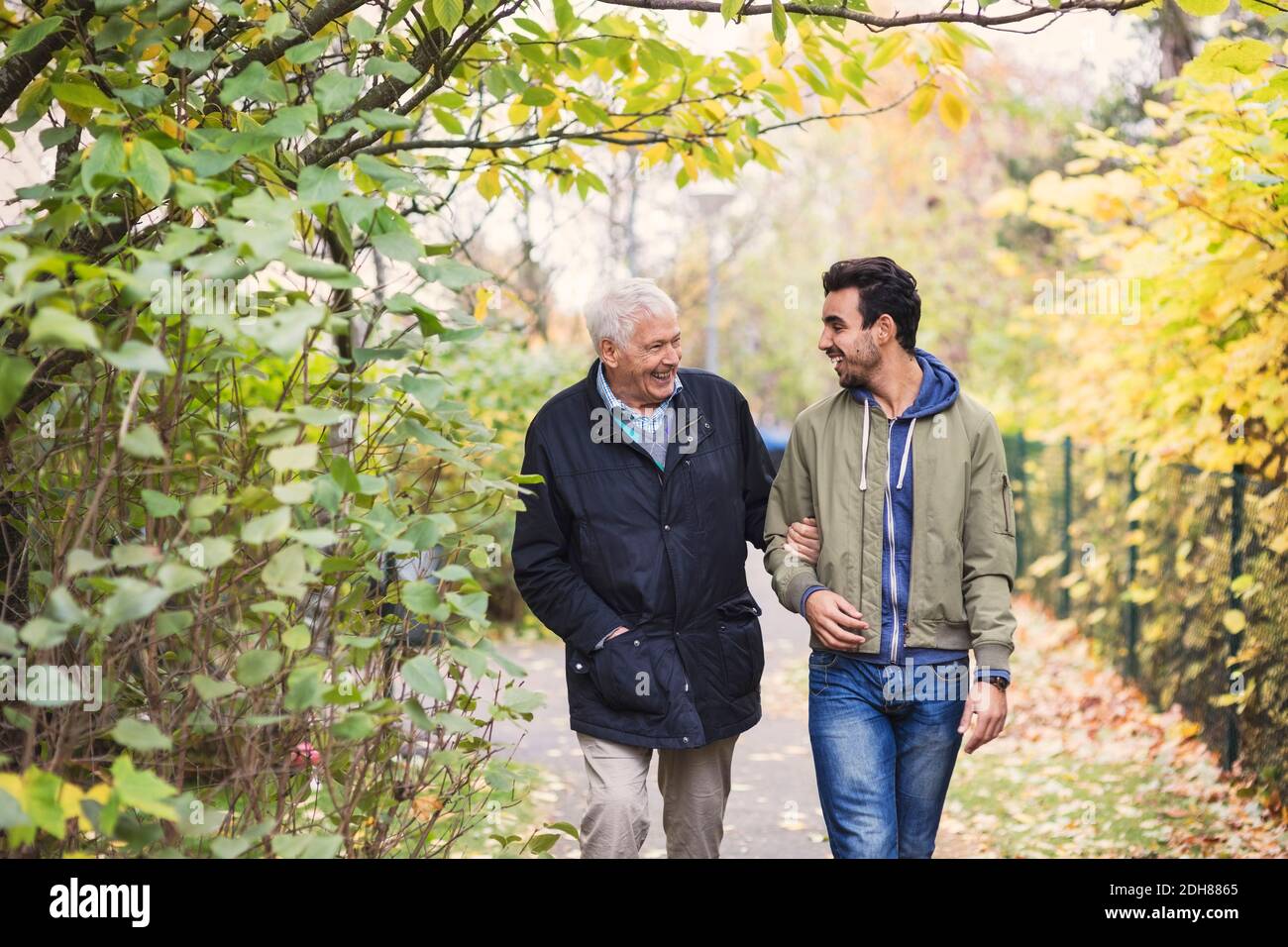 Man walking with hands in pockets hi-res stock photography and images ...