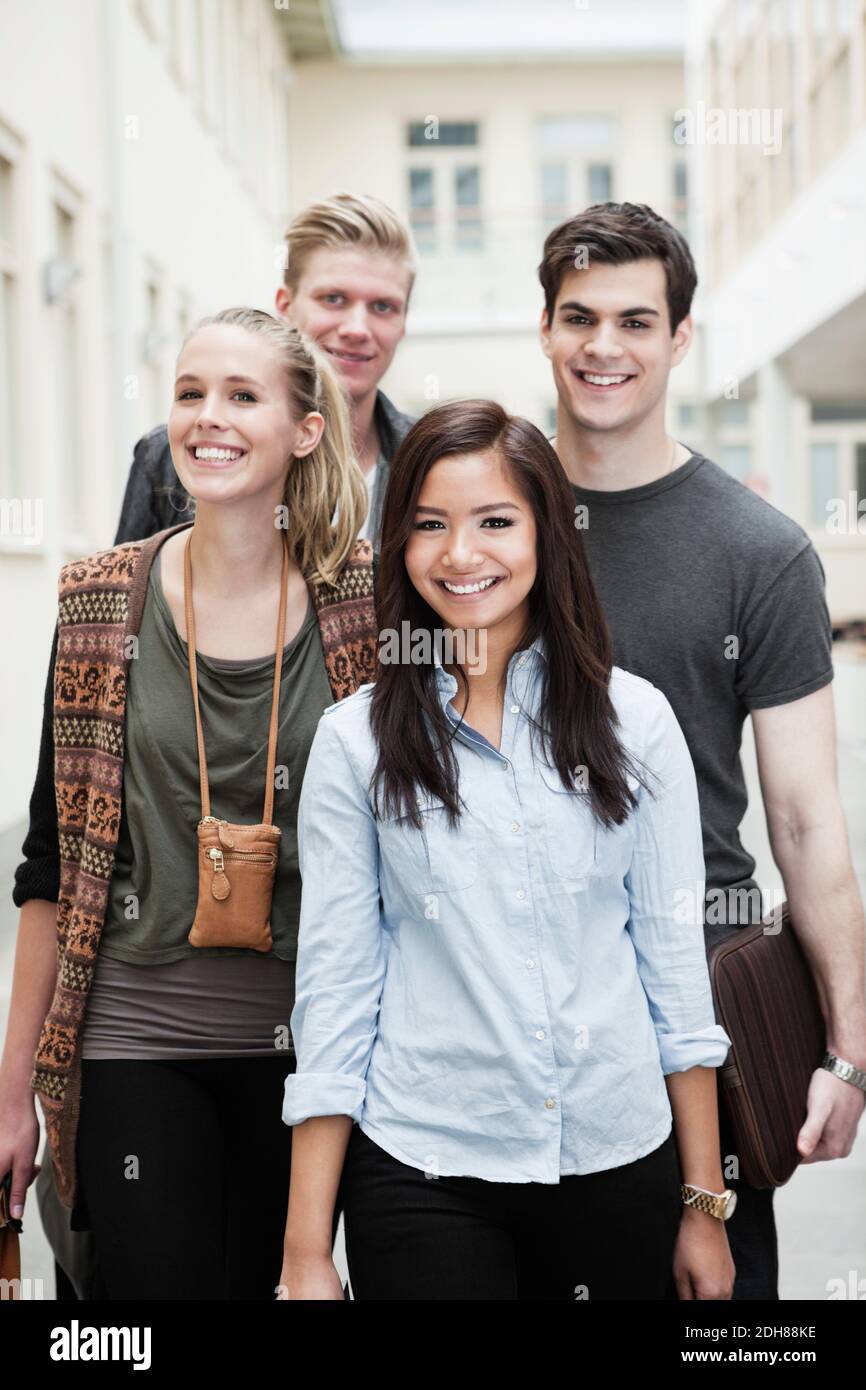 Front view portrait of happy young friends together Stock Photo