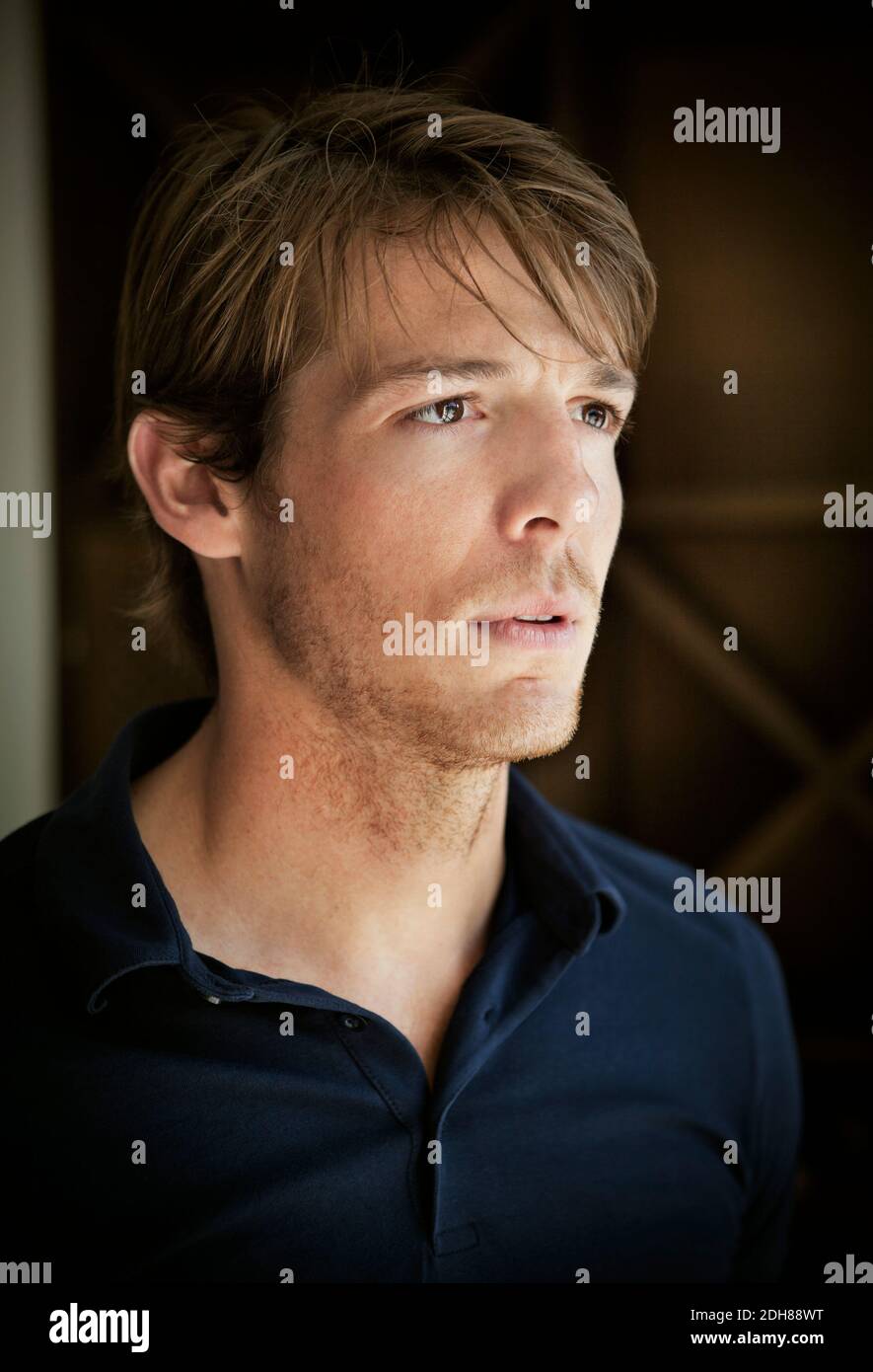 Close up of serious mid adult man looking away Stock Photo