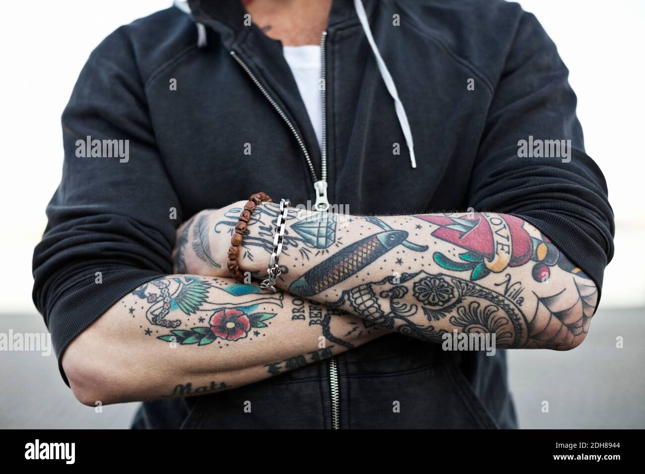 Tattooed man arm coloured hi-res stock photography and images - Alamy