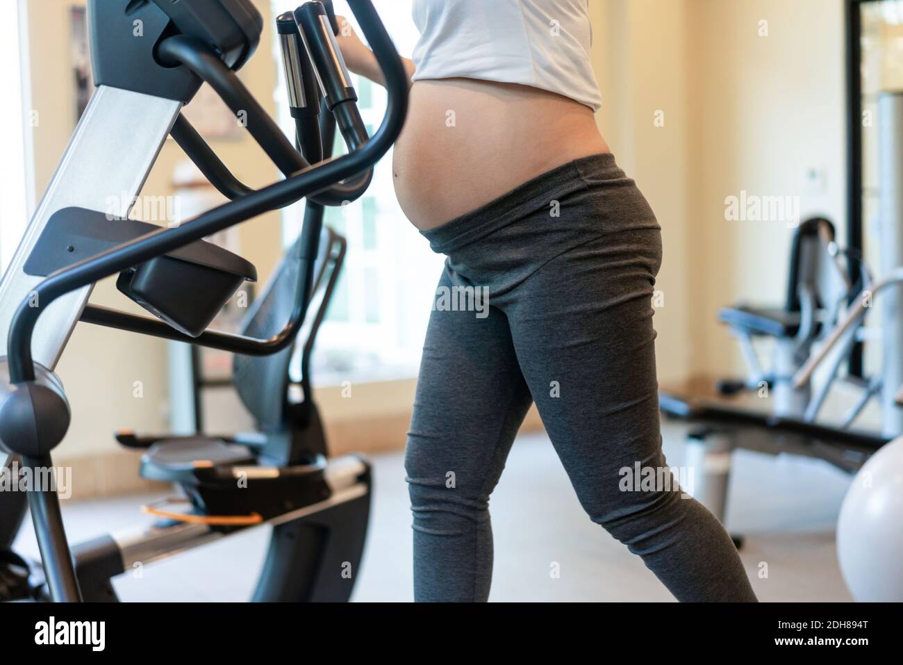 Active Pregnant Woman Exercise In Fitness Center At Yoga Room The Young Expecting Mother