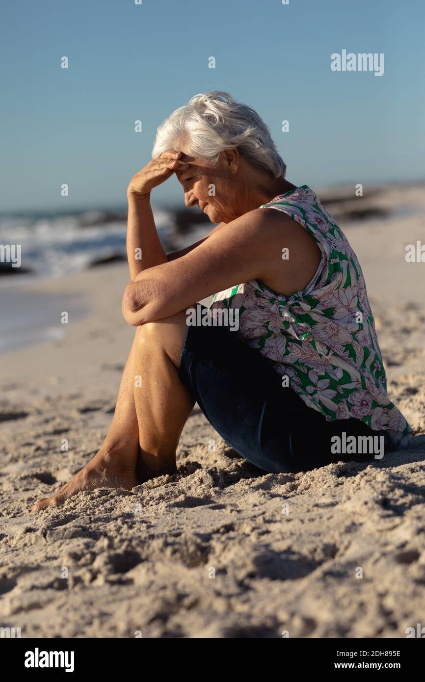 Old Woman Relaxing At The Beach Stock Photo Alamy old-woman-relaxing-at-the-beach-stock-photo-alamy