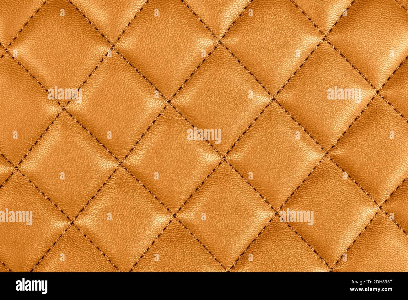 Modern luxury car brown leather interior. Part of perforated leather