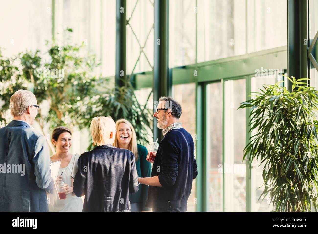 Team of business people having casual meeting in creative office Stock Photo