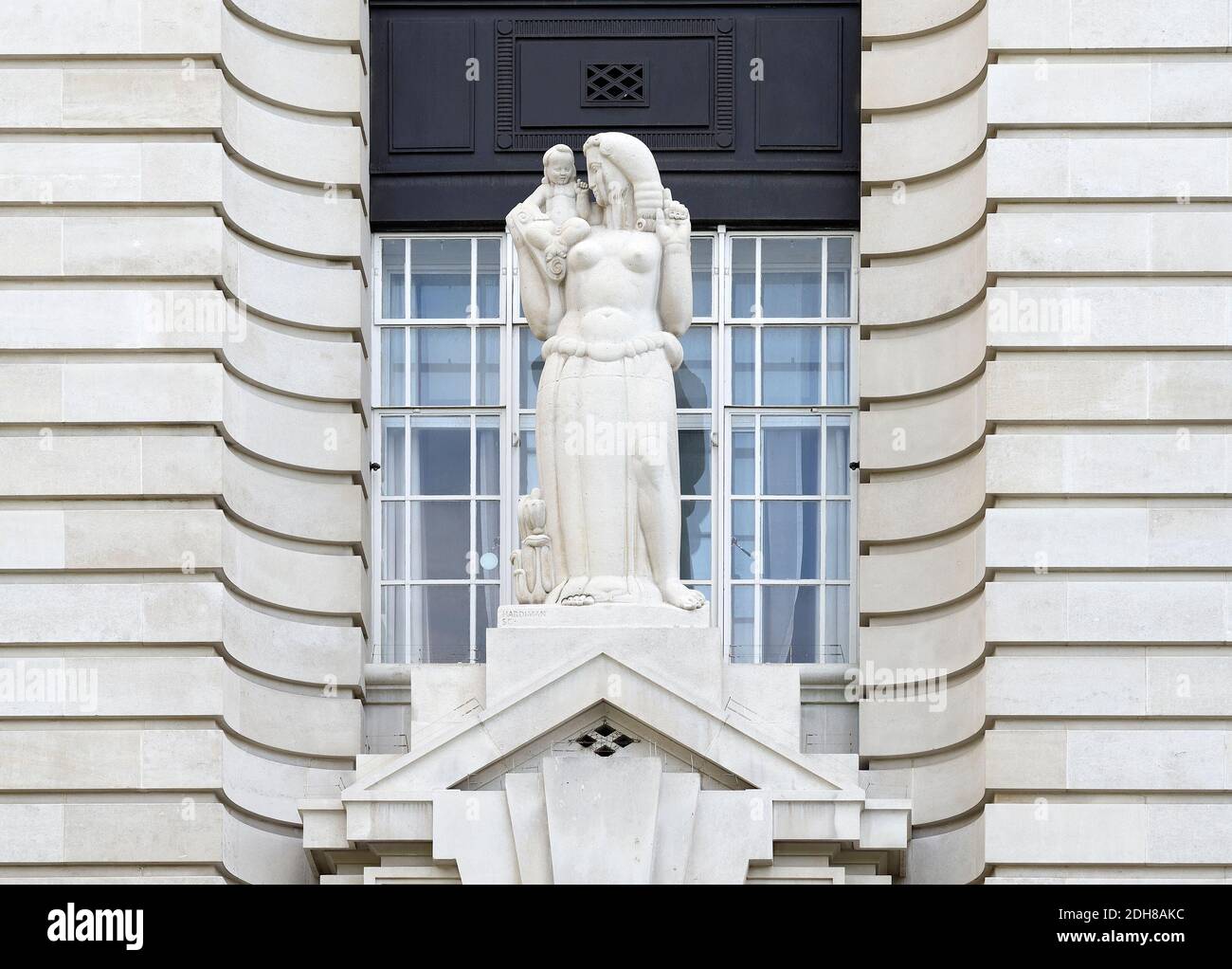 London, England, UK. Sculpture "Child Education" by Alfred Hardiman