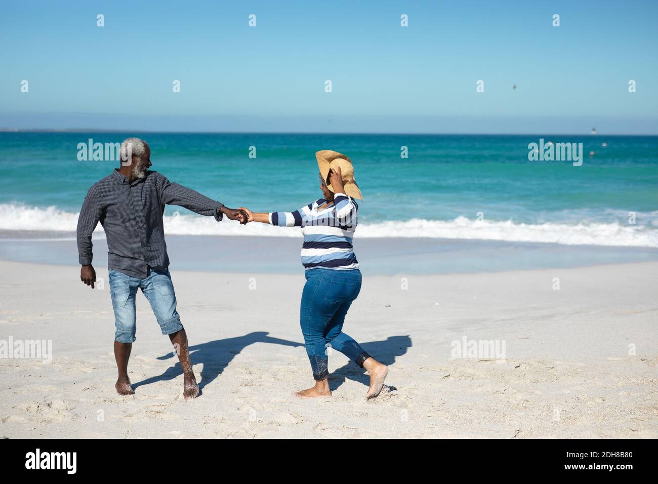 Black couple enjoying beach together hi-res stock photography and images -  Alamy