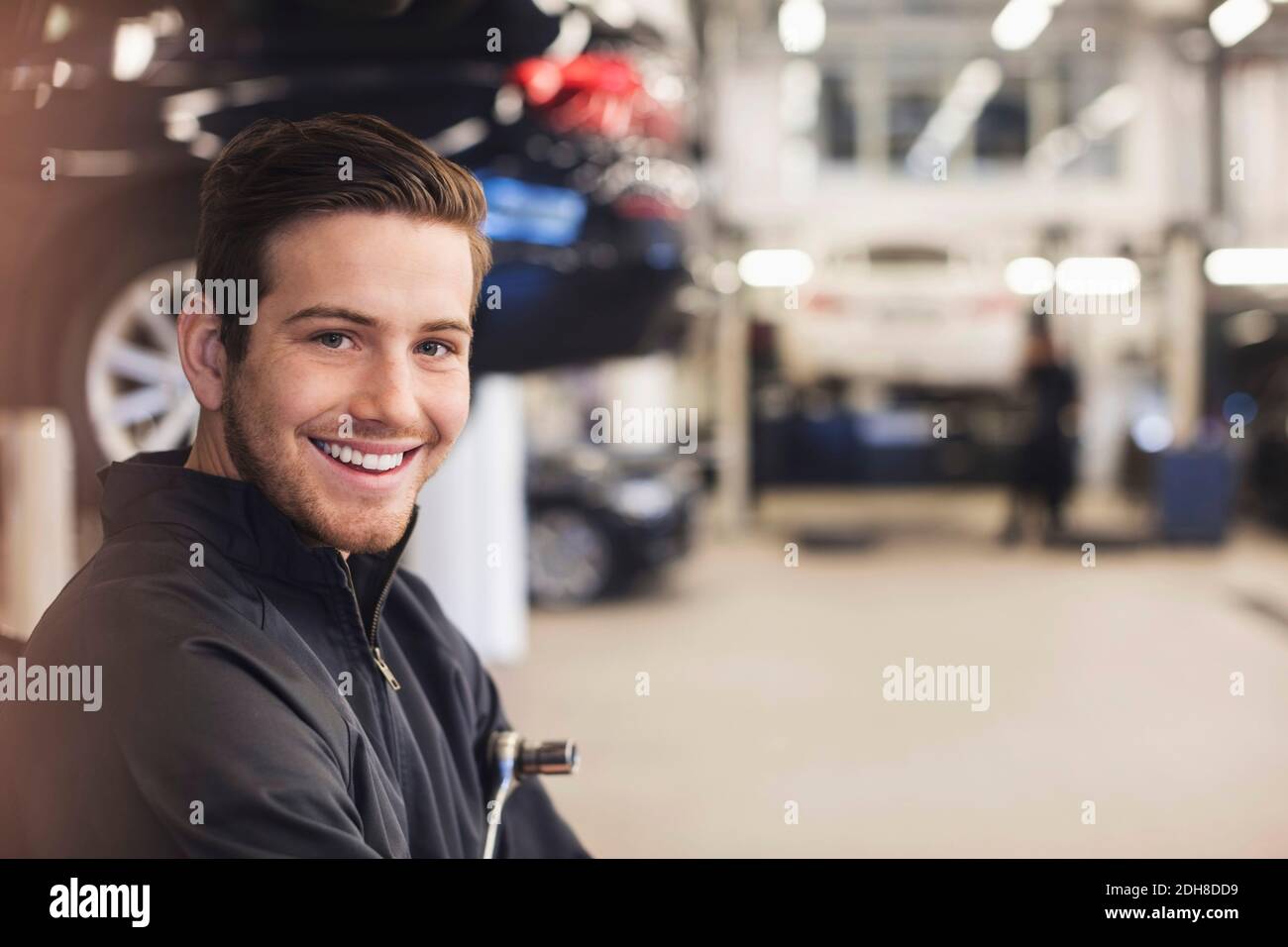 Black mechanic working on car hi-res stock photography and images - Alamy