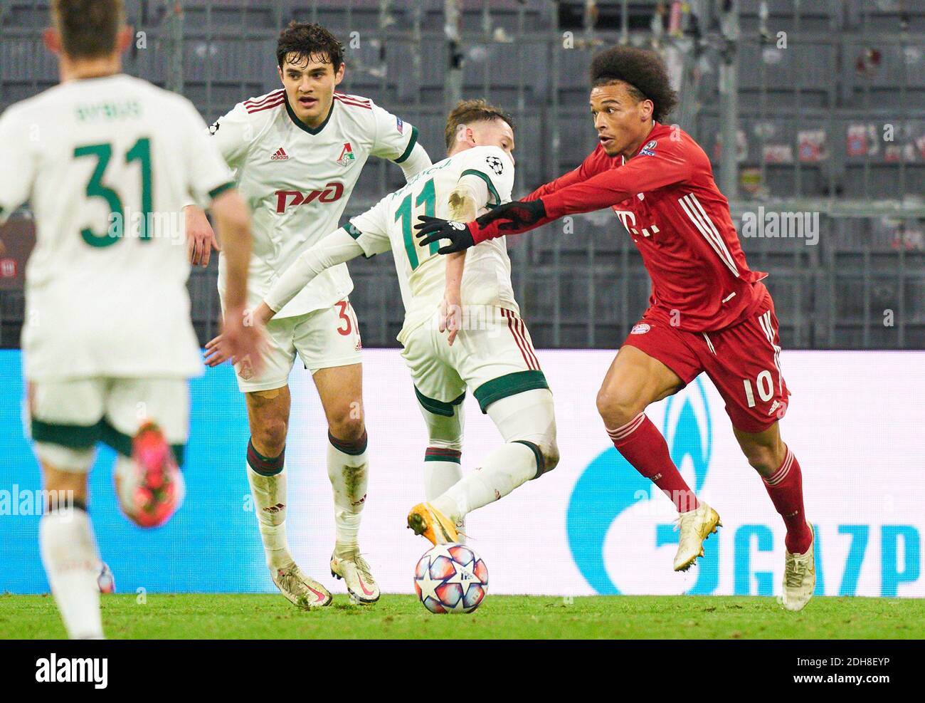 Leroy SANE, FCB 10  compete for the ball, tackling, duel, header, zweikampf, action, fight against Anton MIRANCHUK, Lok Moskau Nr. 11 Stanislav MAGKEEV, Lok Moskau Nr. 37  in the match  FC BAYERN MUENCHEN - LOKOMOTIVE MOSKAU 2-0 of football UEFA Champions League group stage in season 2020/2021 in Munich, December 9, 2020.   © Peter Schatz / Alamy Live News Stock Photo