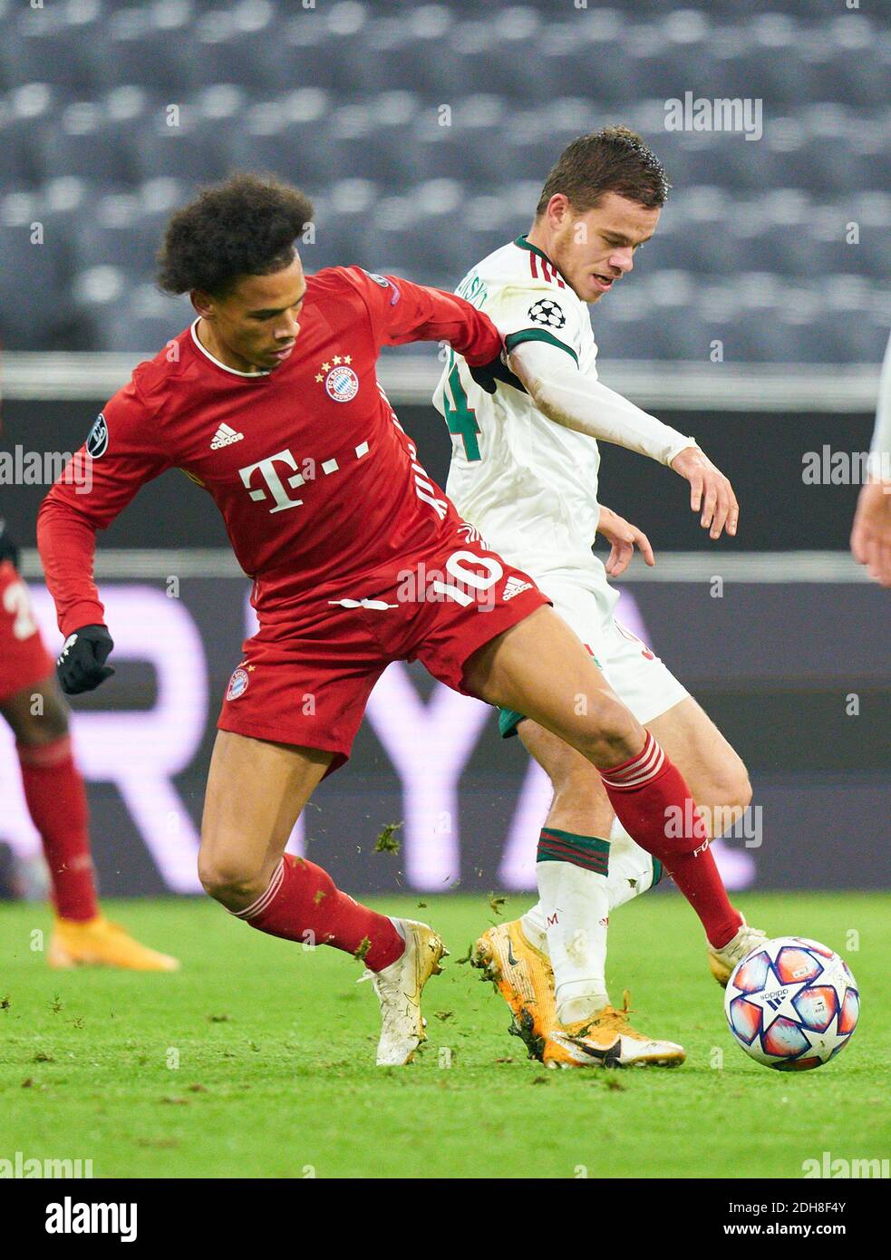 Leroy SANE, FCB 10  compete for the ball, tackling, duel, header, zweikampf, action, fight against Dmitrii RYBCHINSKII, Lok Moskau Nr. 94  in the match  FC BAYERN MUENCHEN - LOKOMOTIVE MOSKAU 2-0 of football UEFA Champions League group stage in season 2020/2021 in Munich, December 9, 2020.   © Peter Schatz / Alamy Live News Stock Photo
