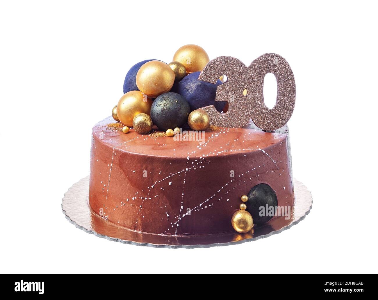 An original conceptual chocolate cake with round ball decorations ...