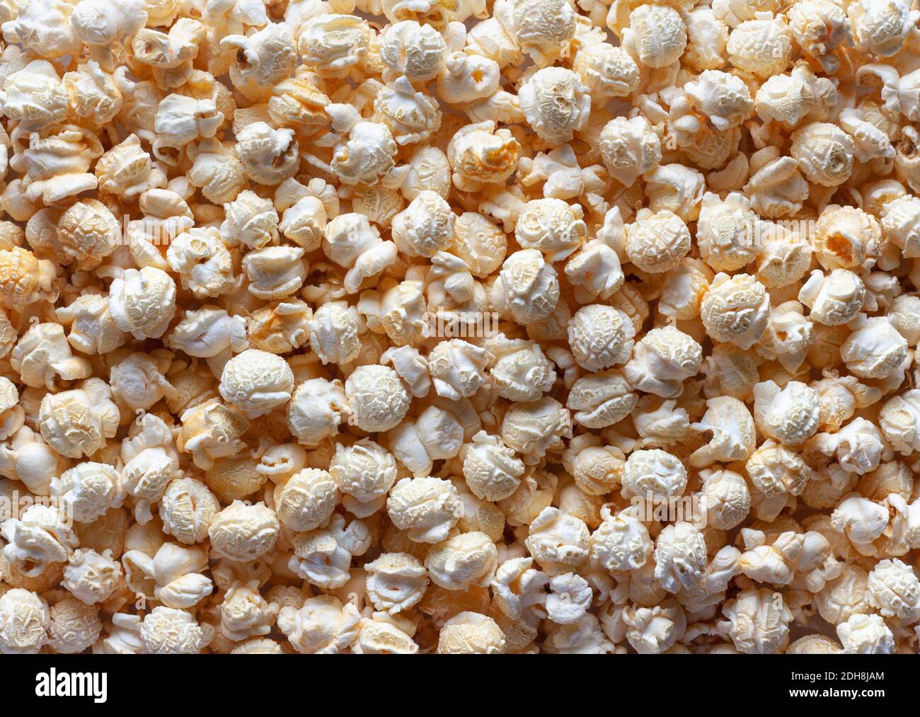 Photo of scattered popcorn texture background Stock Photo Alamy