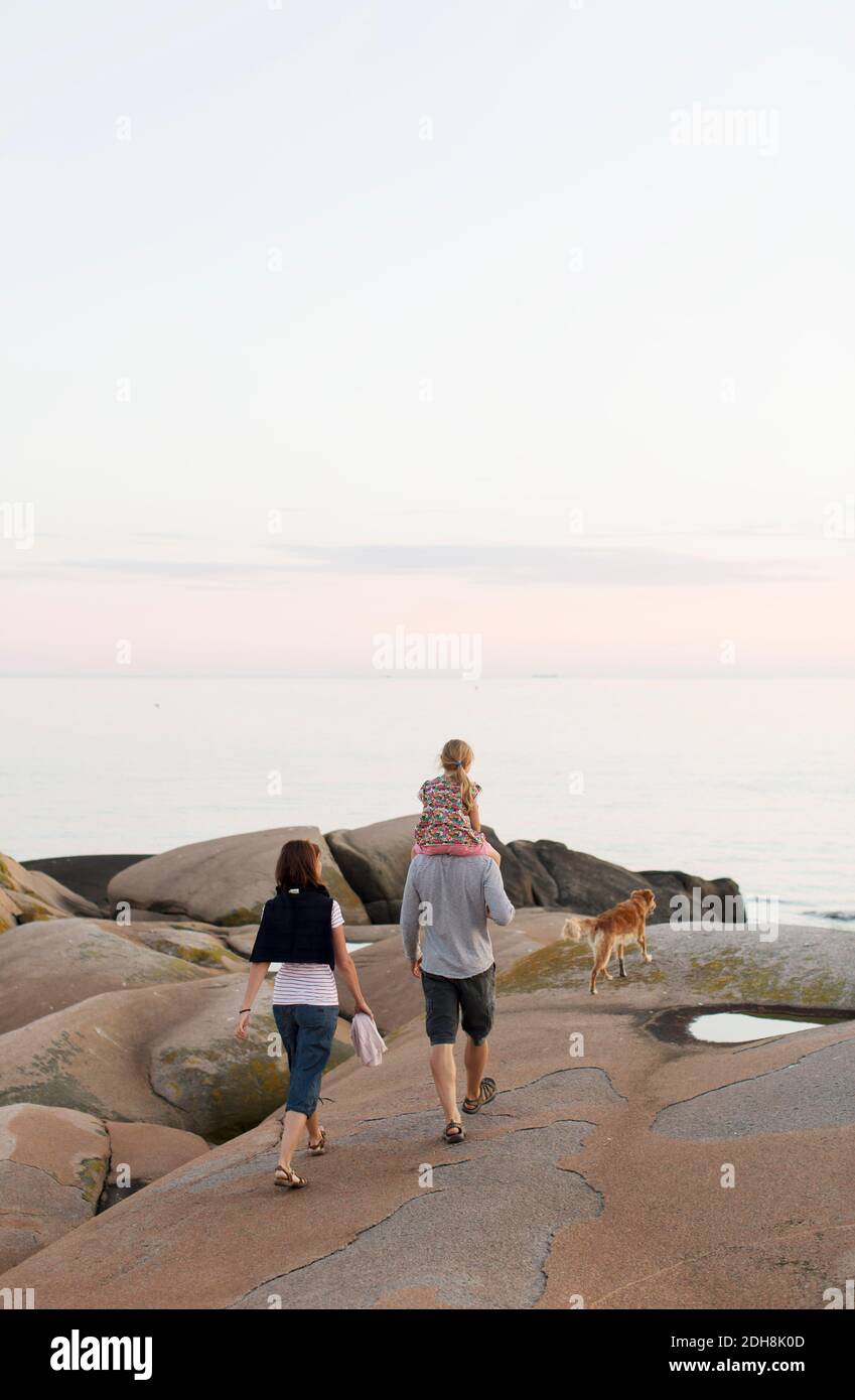 Man carrying woman over shoulder hi-res stock photography and images ...