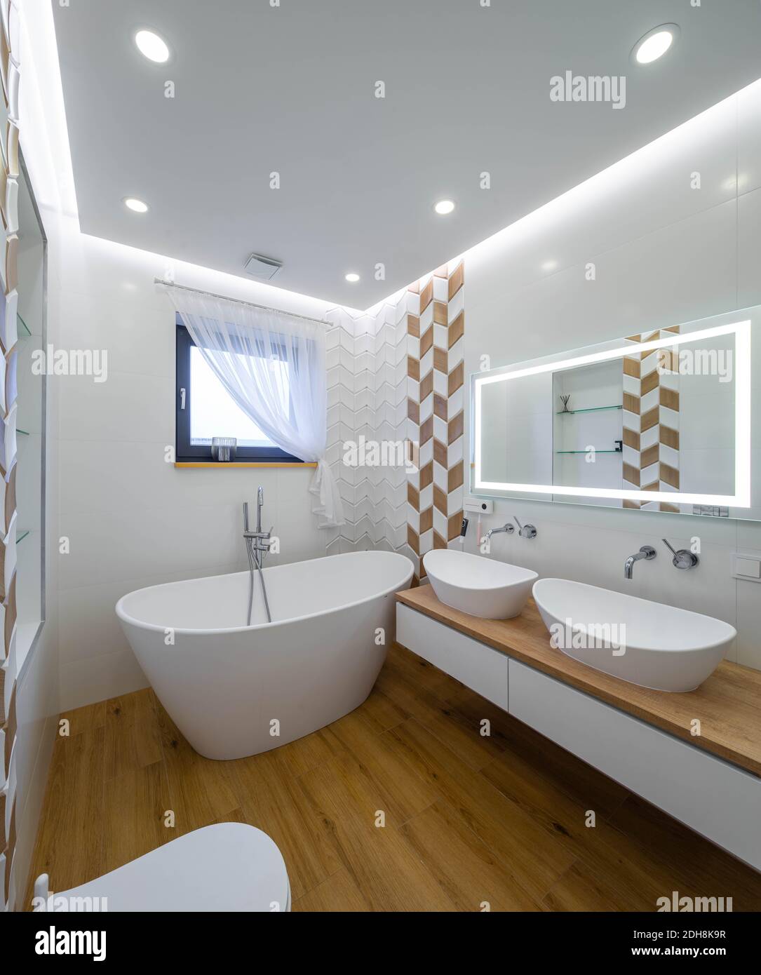 Modern scandinavian interior of small bathroom. Double sink on wooden