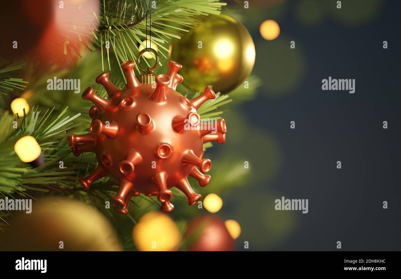 Covid19 and winter flu bugs virus bauble christmas tree decoration hanging from a decorated