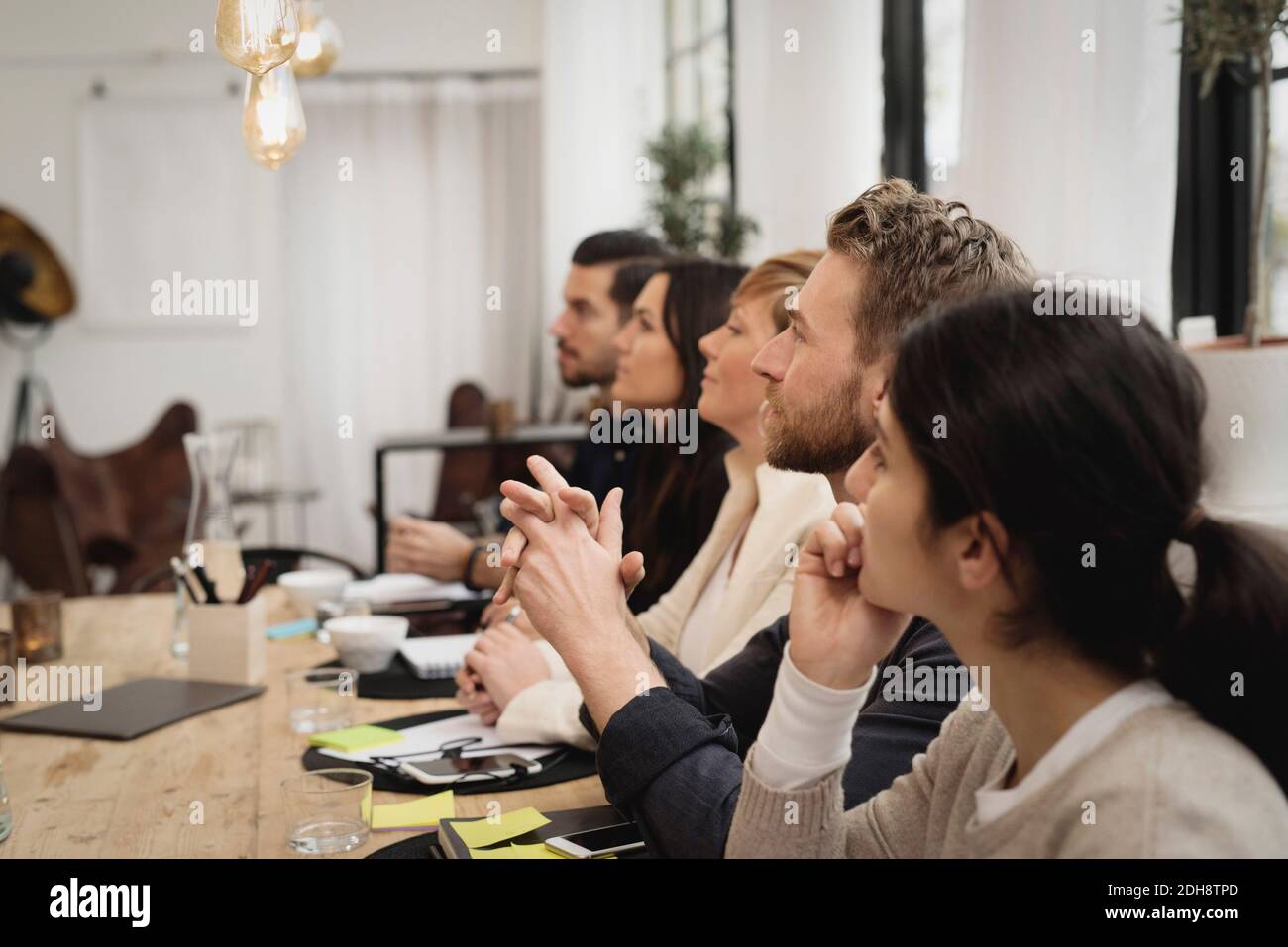 Business people during interview at table in office Stock Photo