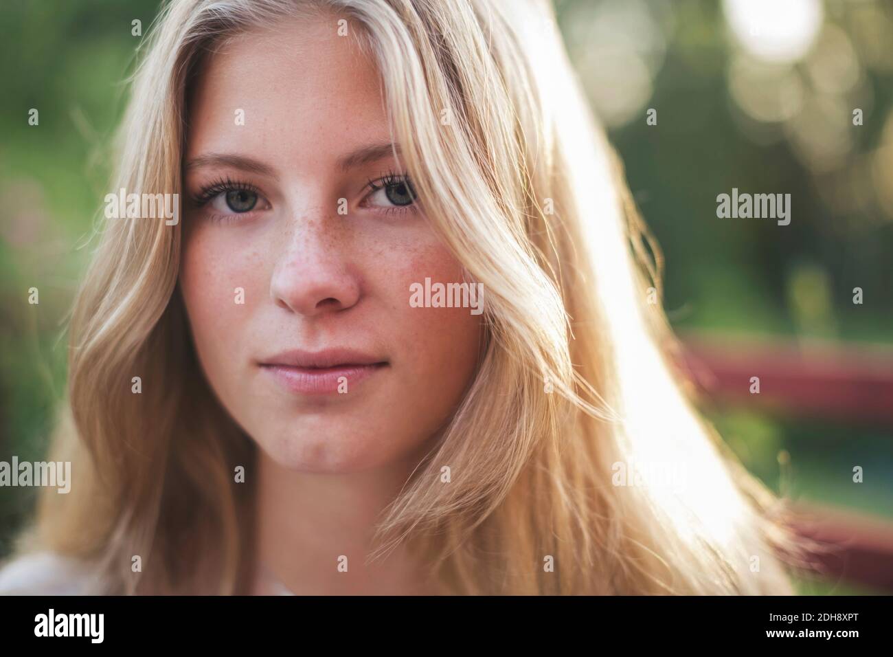 Close-up portrait of teenage girl in back yard Stock Photo