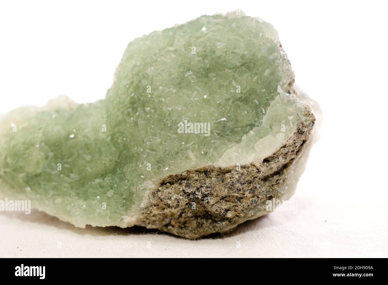 apophyllite on prehnite crystal mineral sample on granite Stock Photo
