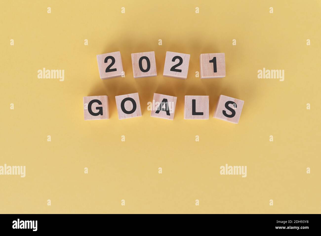 2021 New Year goals concept yellow background Stock Photo