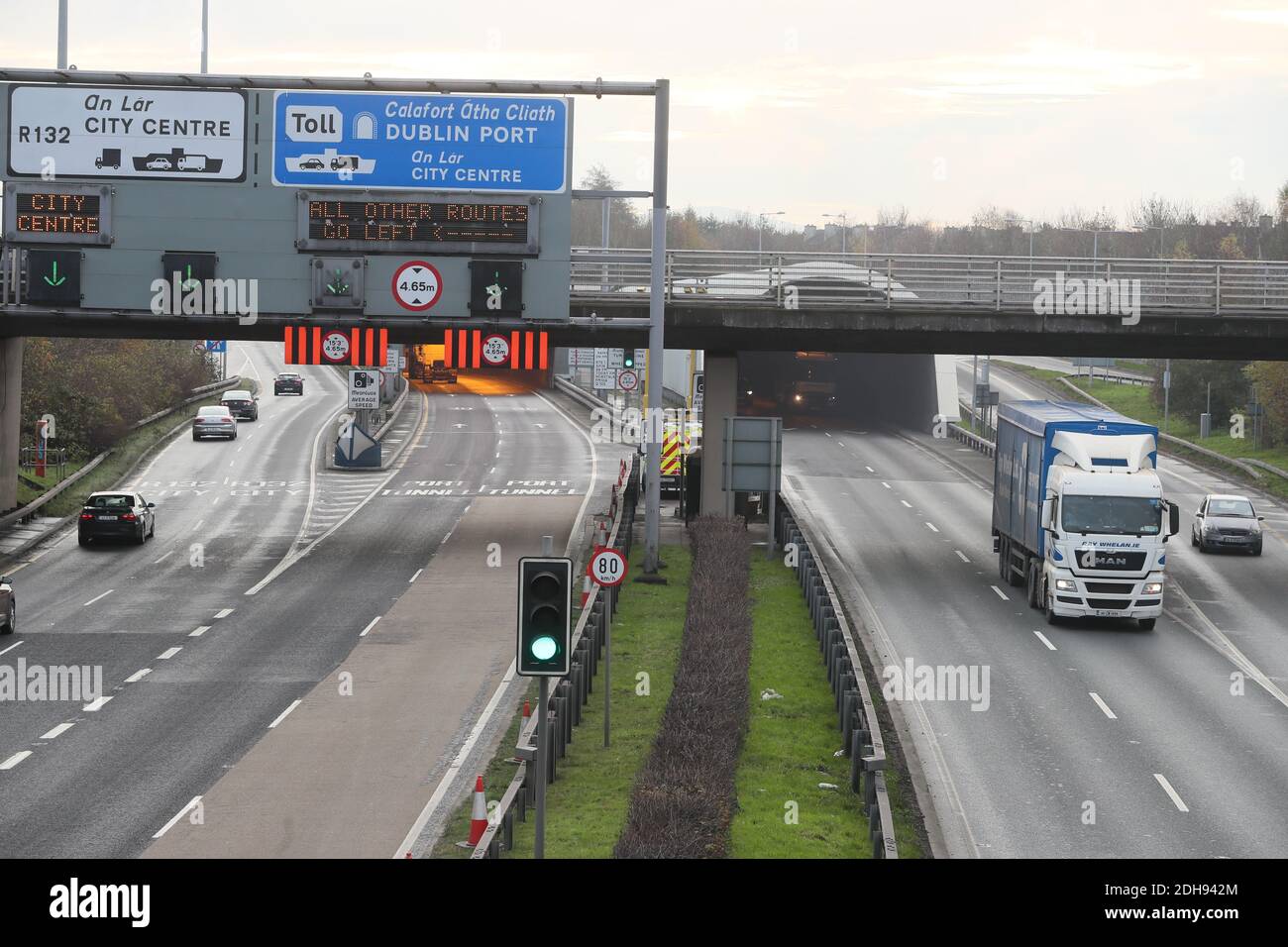 A lorry exits the Dublin Port tunnel on the M1 motorway, which connects Dublin Port in the Republic of Ireland with Northern Ireland. Stock Photo