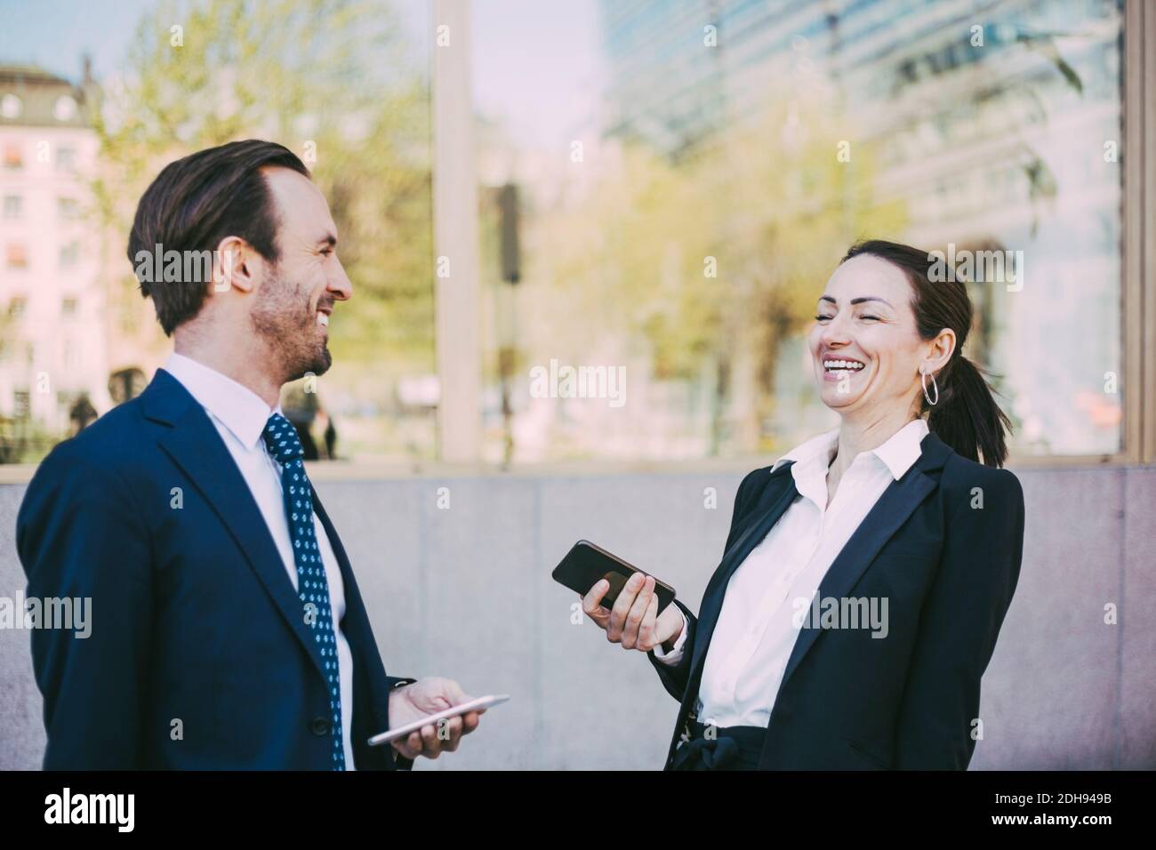 Smiling female male businesspeople hi-res stock photography and images ...