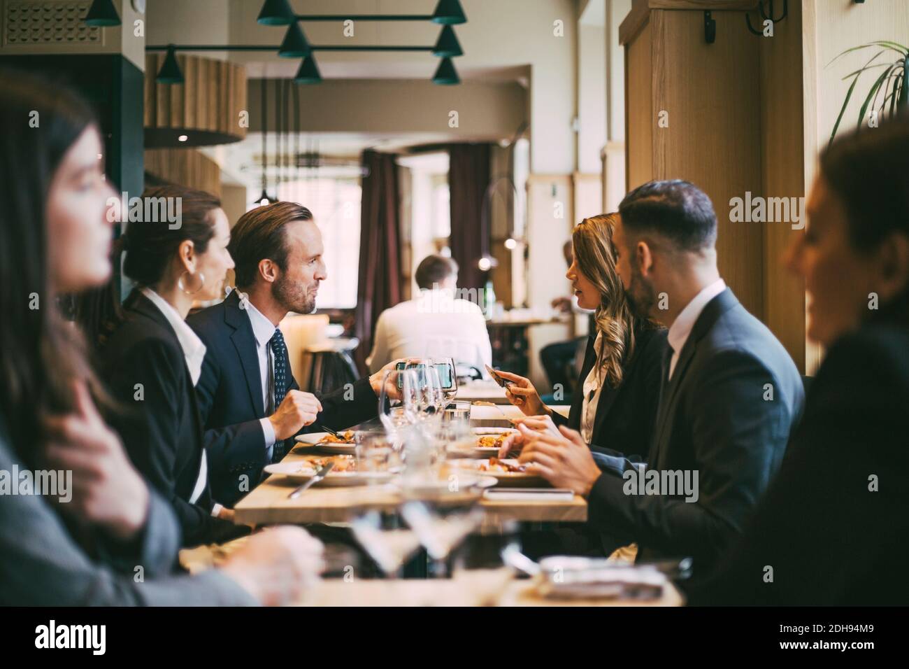 Business coworkers at lunch in restaurant Stock Photo