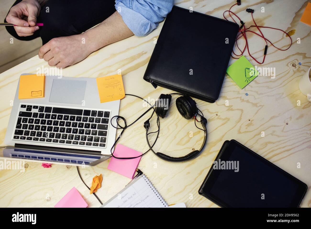 Cropped image of male blogger sitting at desk in creative office Stock Photo