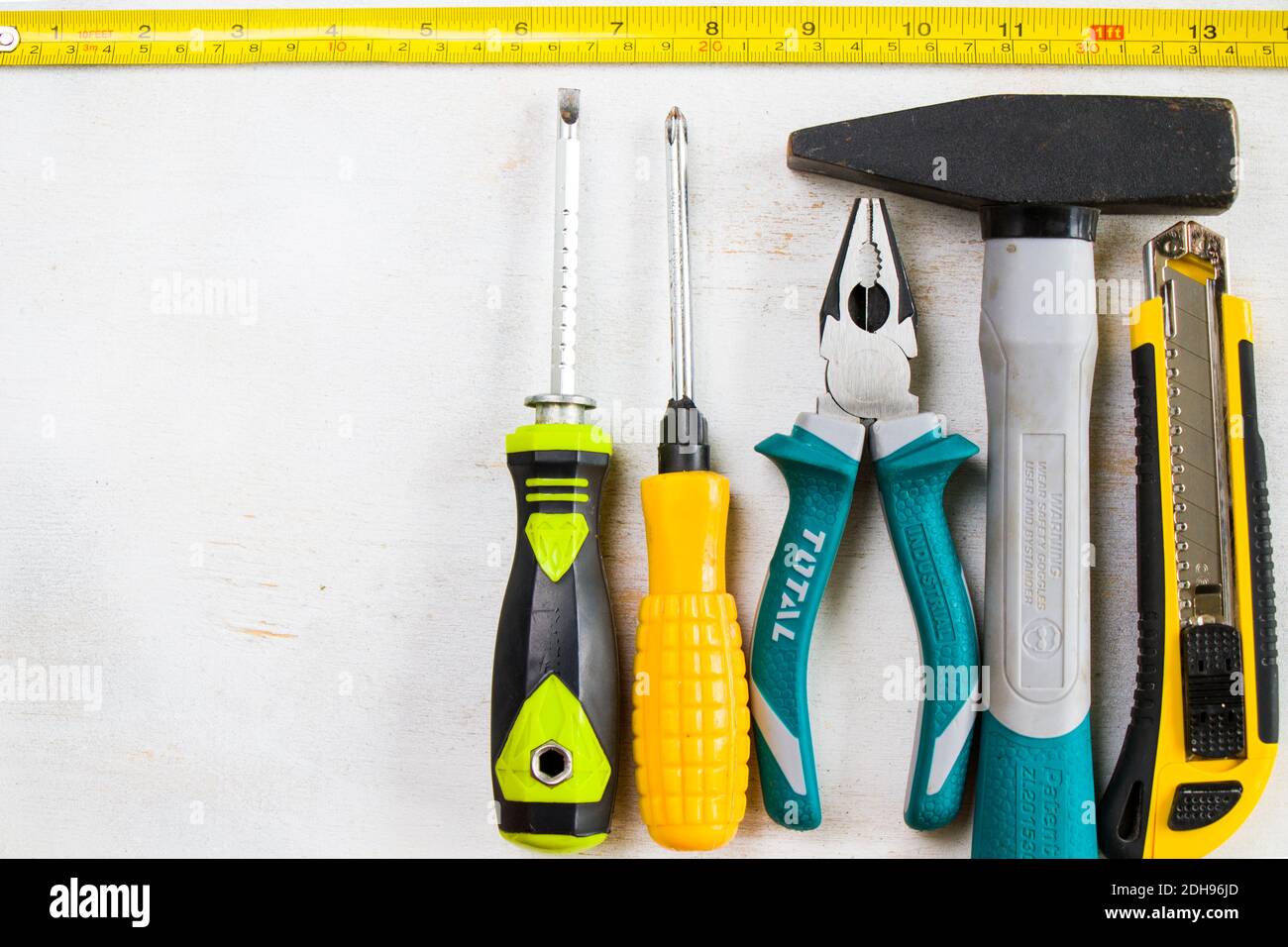 Building Instrument Tools Building instrument set on the white background, tape measure, pliers ...