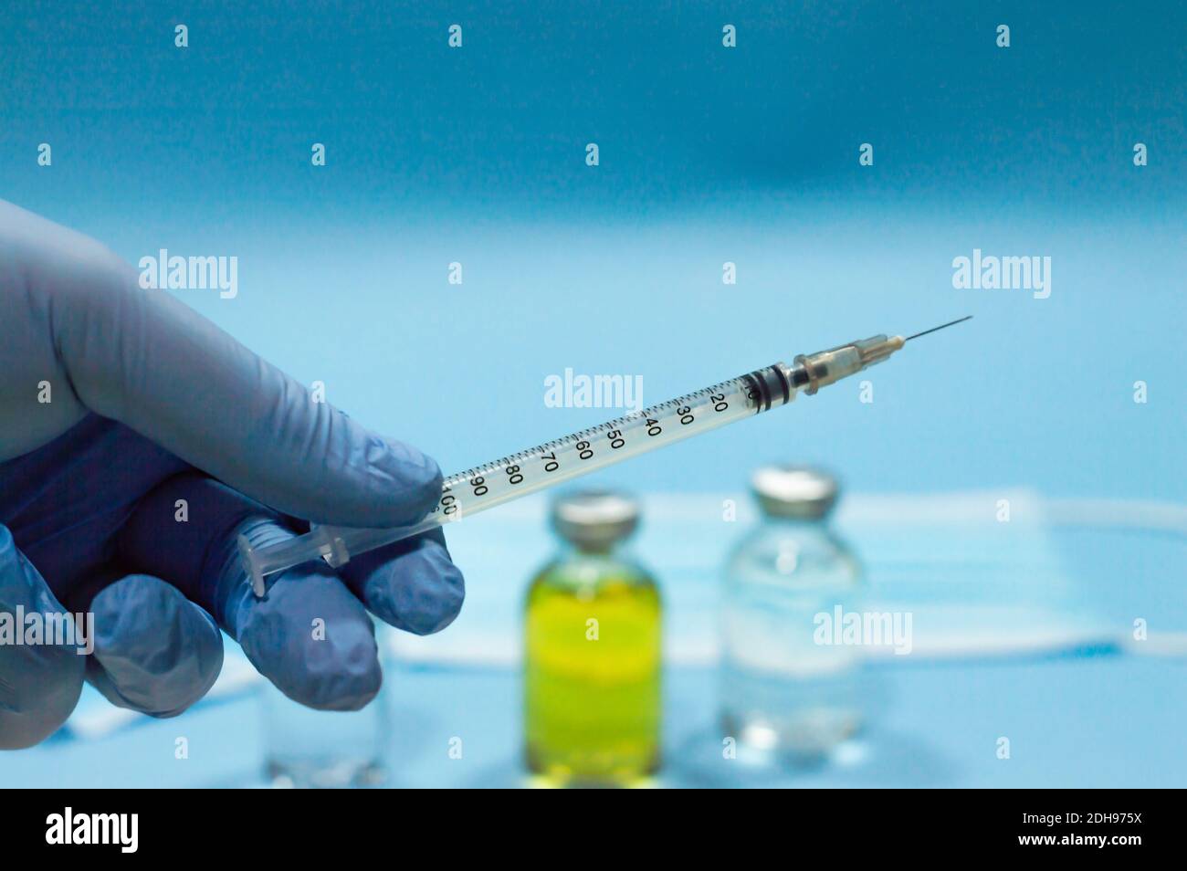 Doctor's hand with syringe Stock Photo