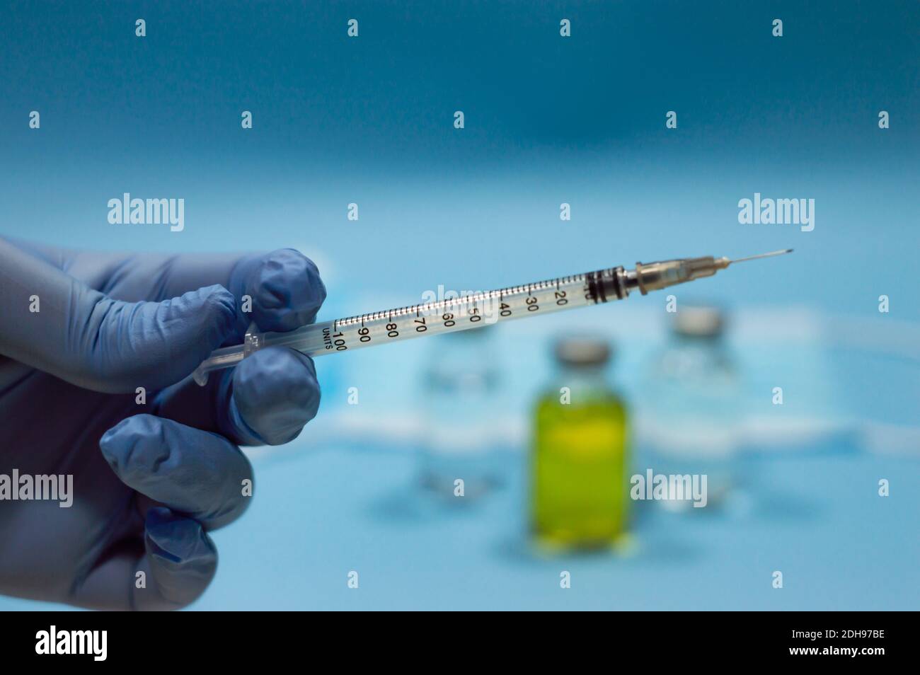 Doctor's hand with syringe Stock Photo