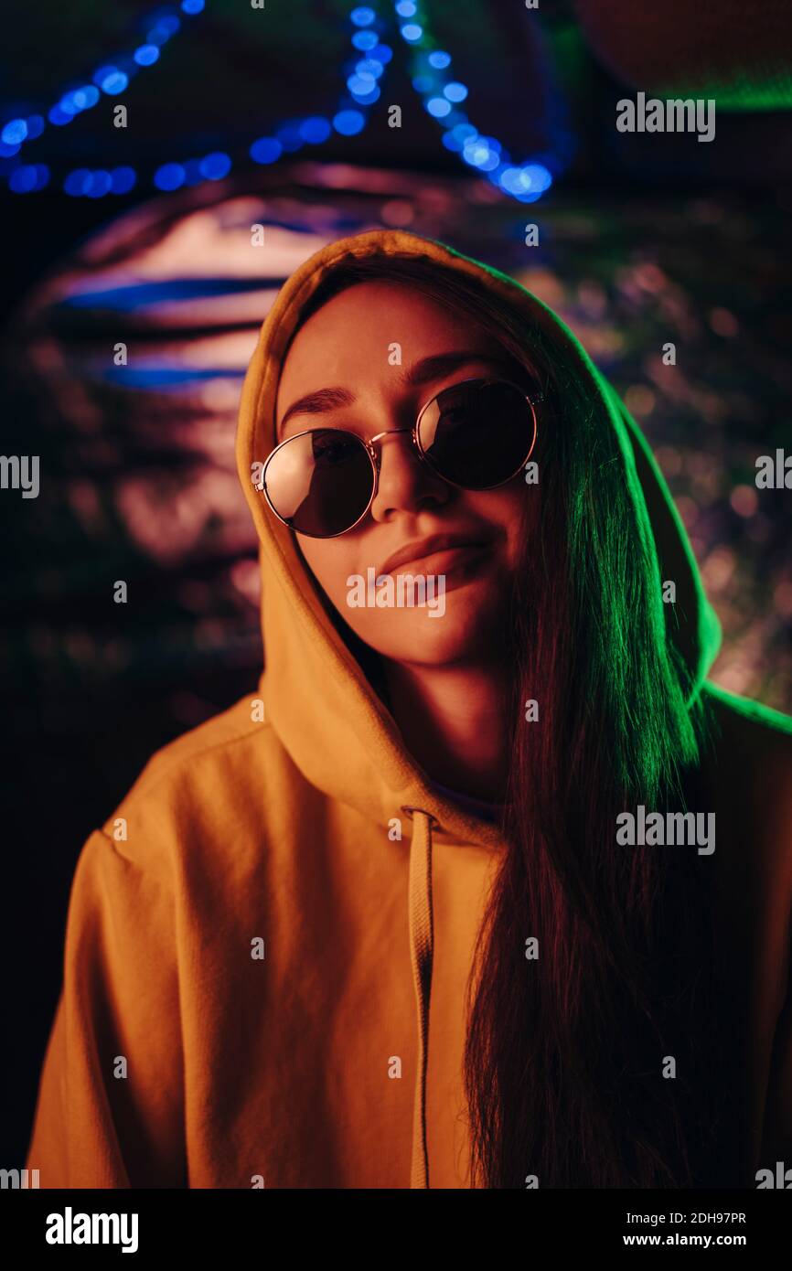 Woman wearing hood sunglasses hi-res stock photography and images - Alamy