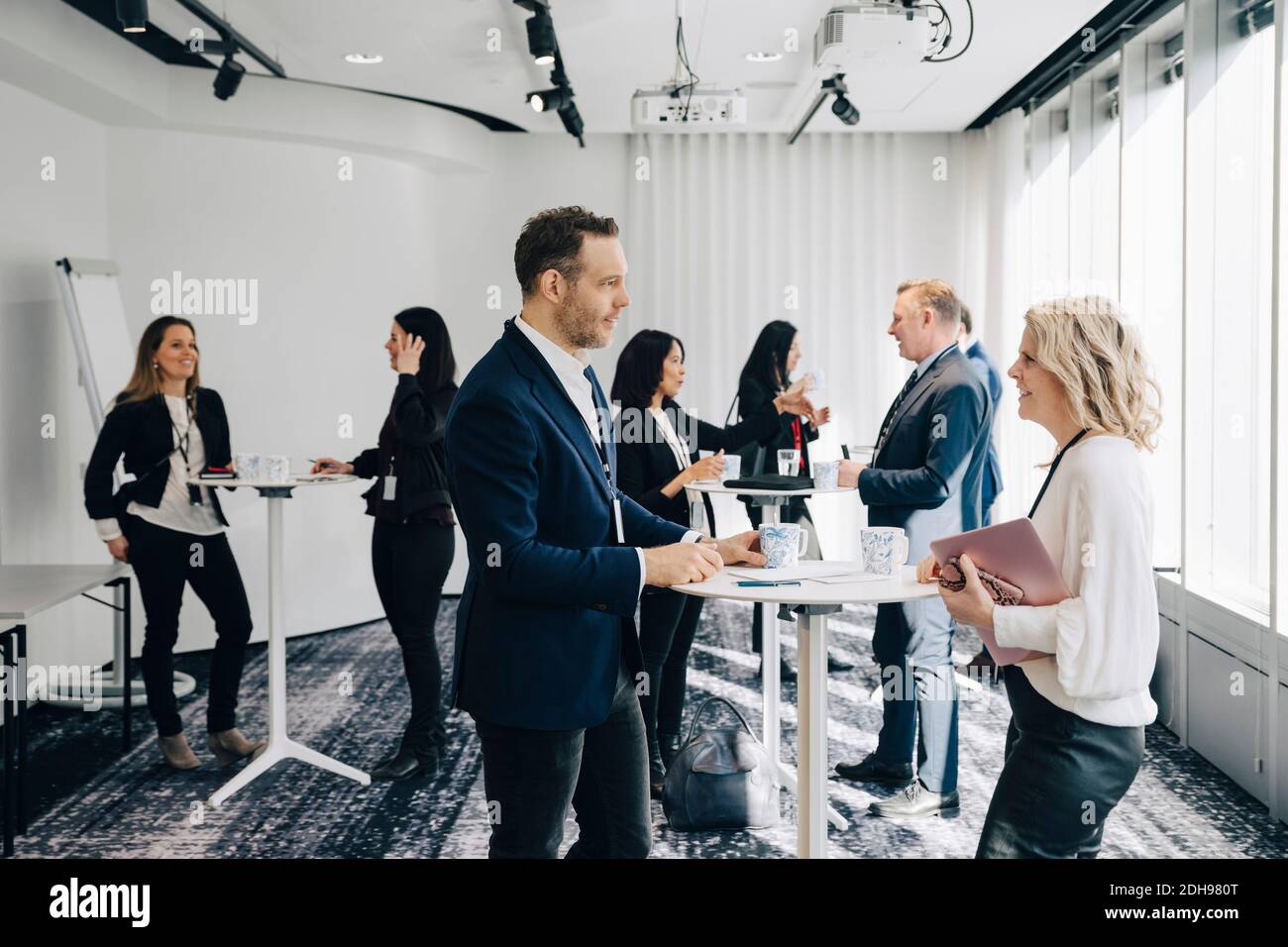 Business professionals discussing at workplace Stock Photo