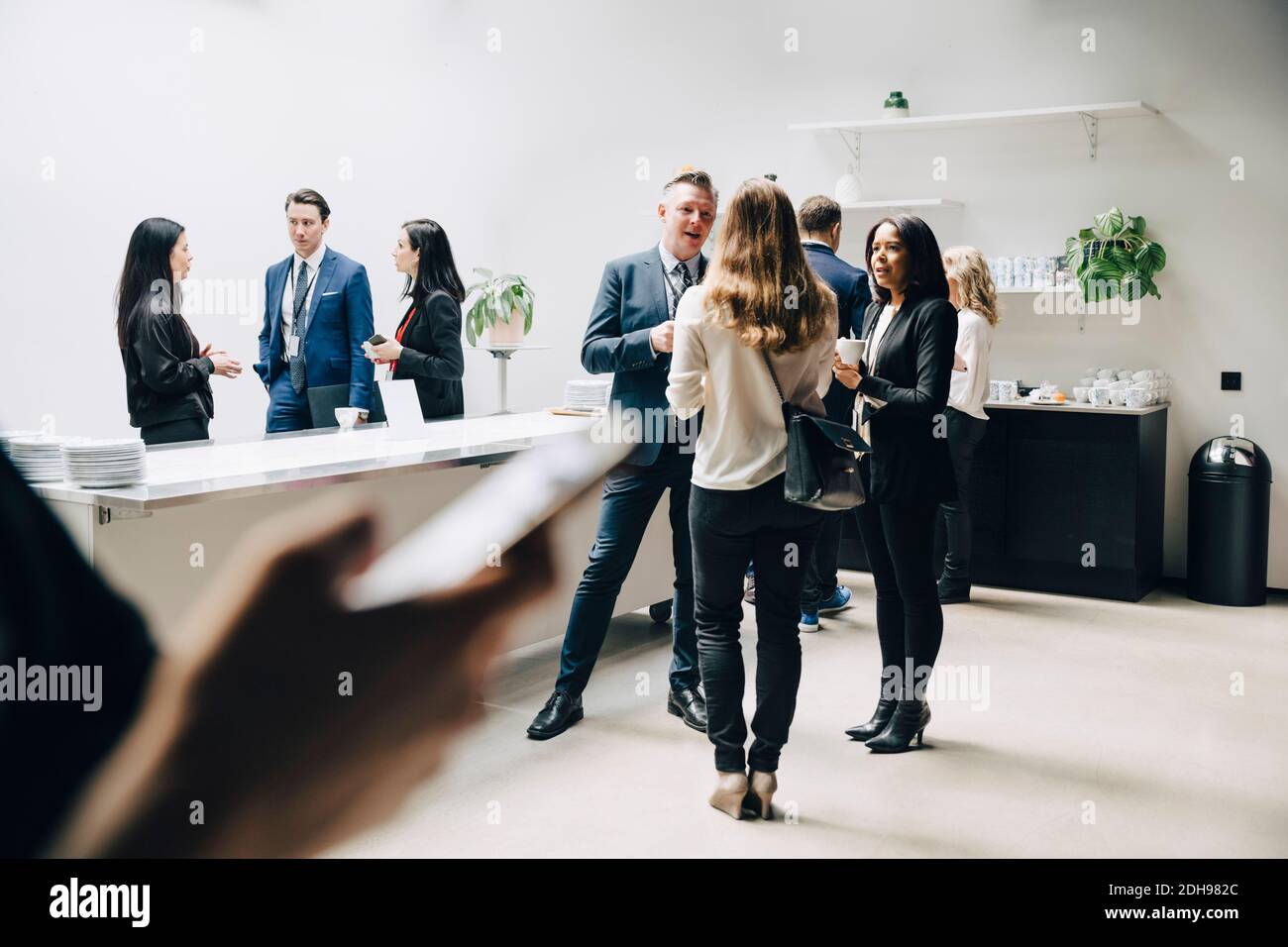Entrepreneurs discussing at office seminar Stock Photo