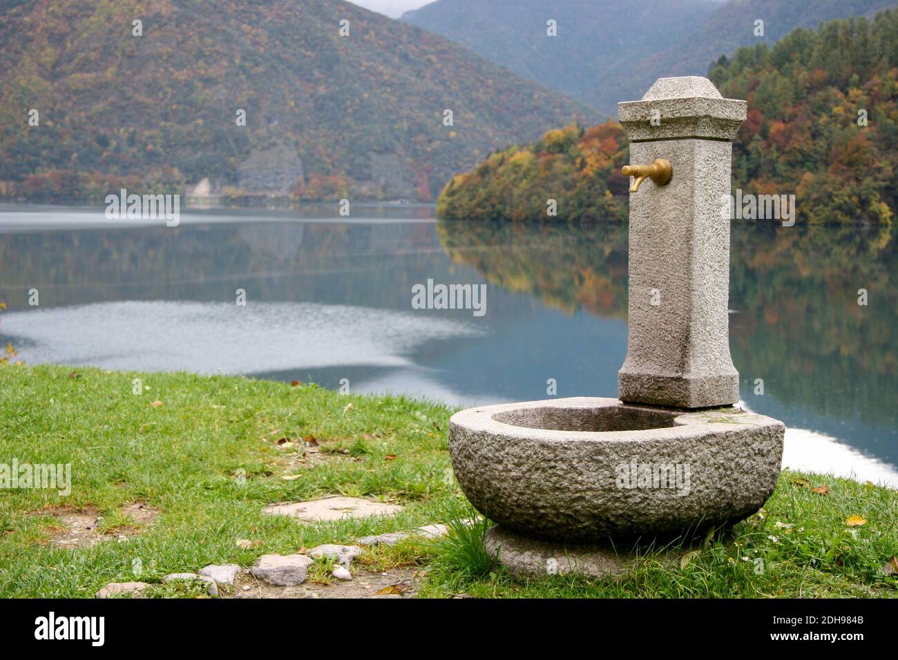 Water fountain by Lago d'Idro in Brescia Italy Stock Photo