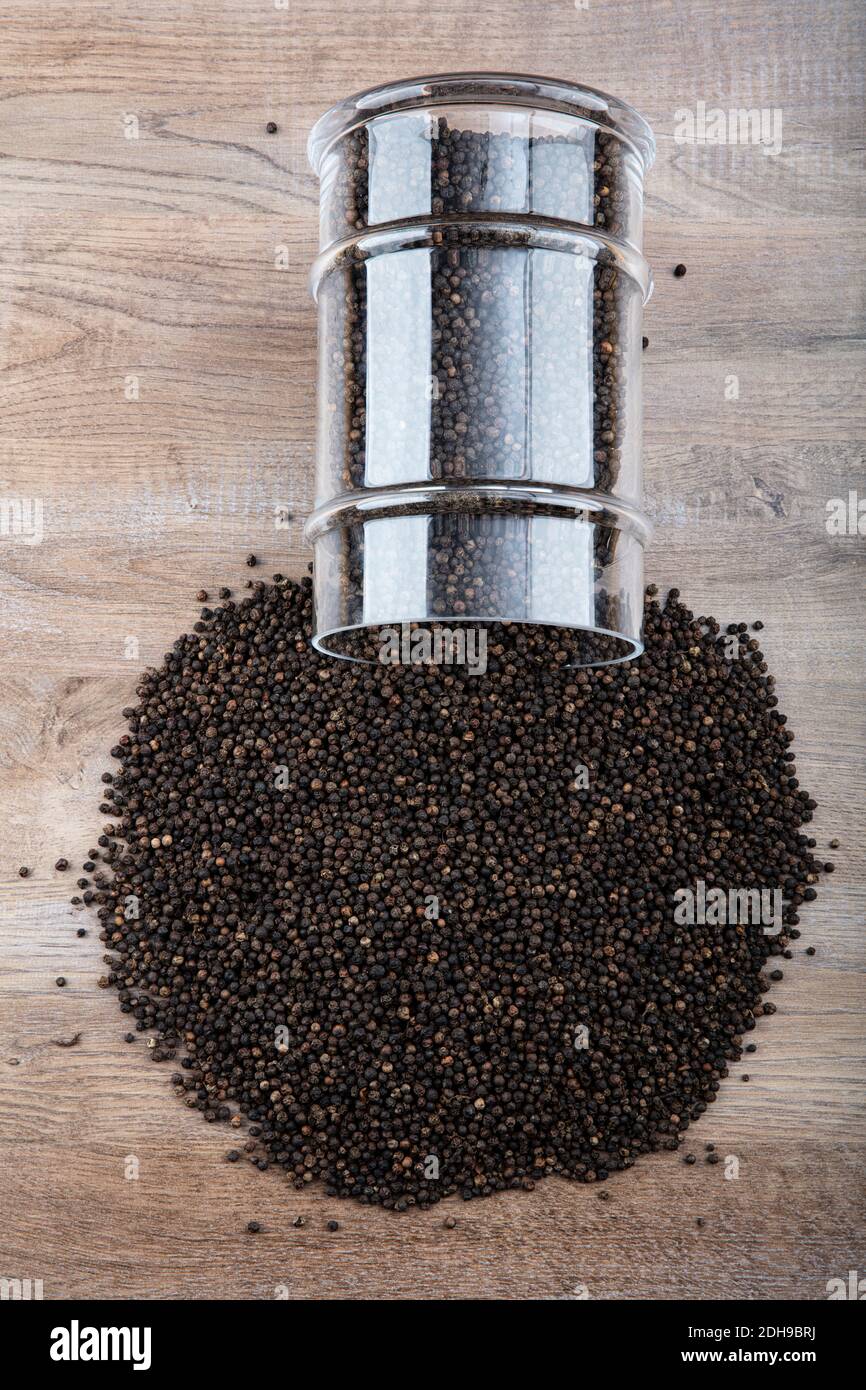 milled black pepper ,Black peppercorns and Black pepper Powder. the textures background of black