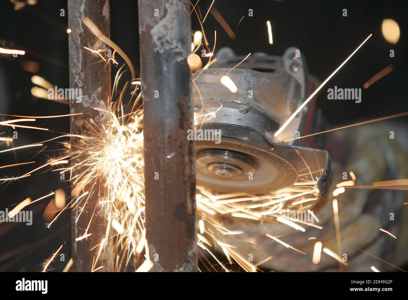 Sparks while working with a angle grinder Stock Photo