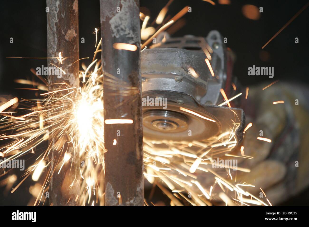 Sparks while working with a angle grinder Stock Photo