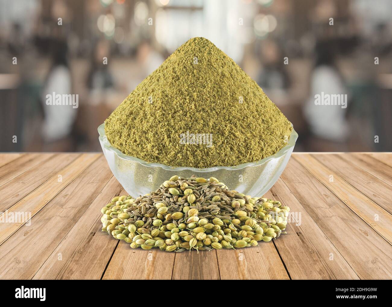 Coriander Powder (Dhaniya Powder) in a glass bowl with Coriander Seeds