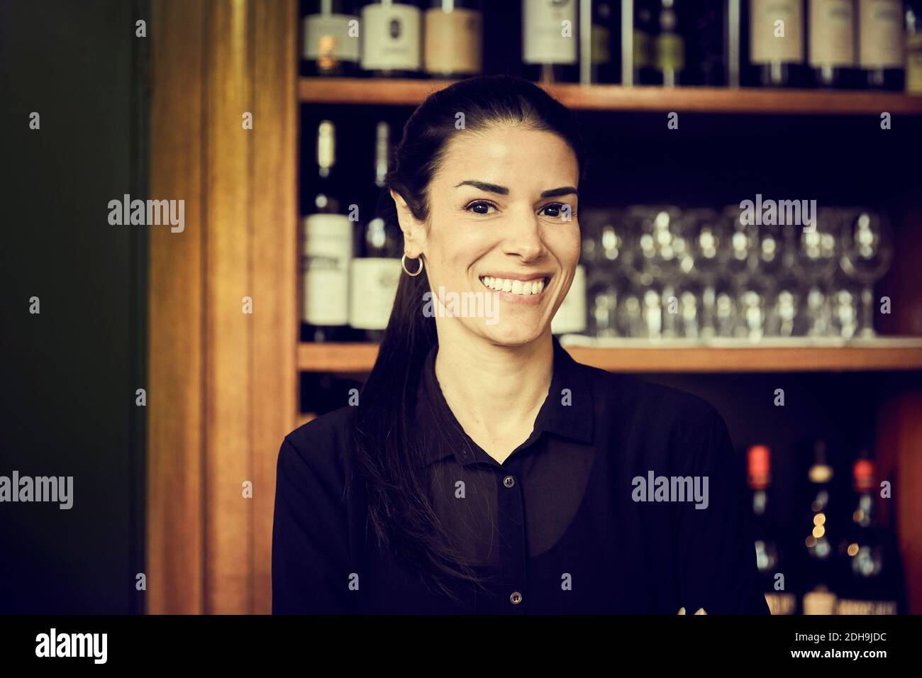 Cafe owner smiling camera hi-res stock photography and images - Alamy