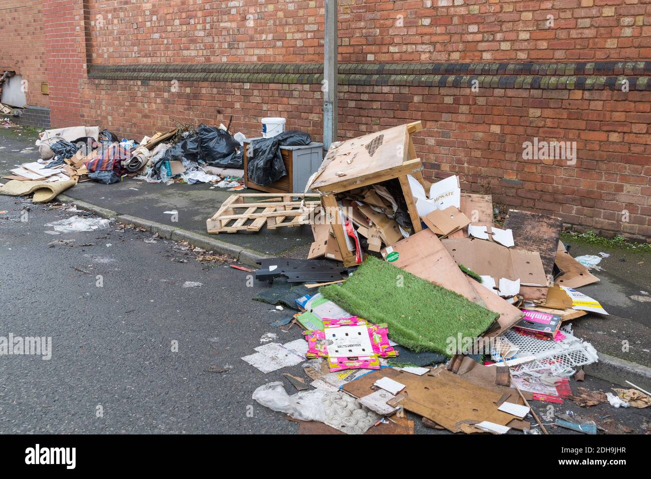 Derelict factories and fly tipped rubbish line Abberley Street in Cape Hill, Smethwick, West Midlands, UK Stock Photo
