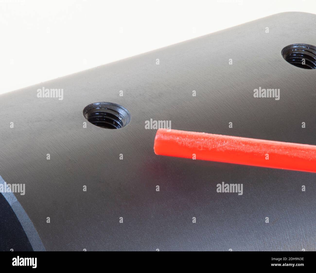 Air going into the hole used to mount a scope base on a bolt action ...