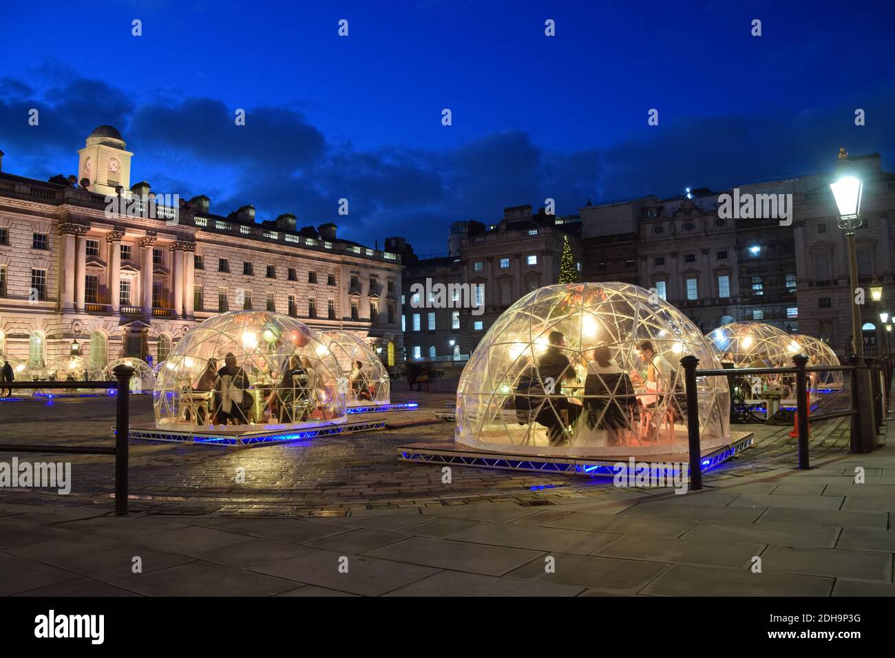 View of Winter Domes at Somerset House in London. The domes, resembling igloos, are installed in the courtyard for indoor private dining during the winter months. Stock Photo