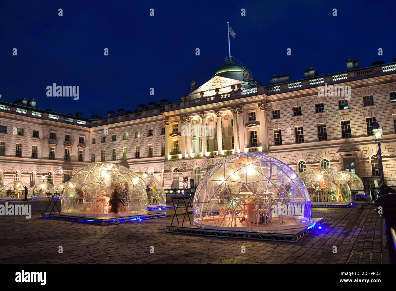 View of Winter Domes at Somerset House in London. The domes, resembling igloos, are installed in the courtyard for indoor private dining during the winter months. Stock Photo