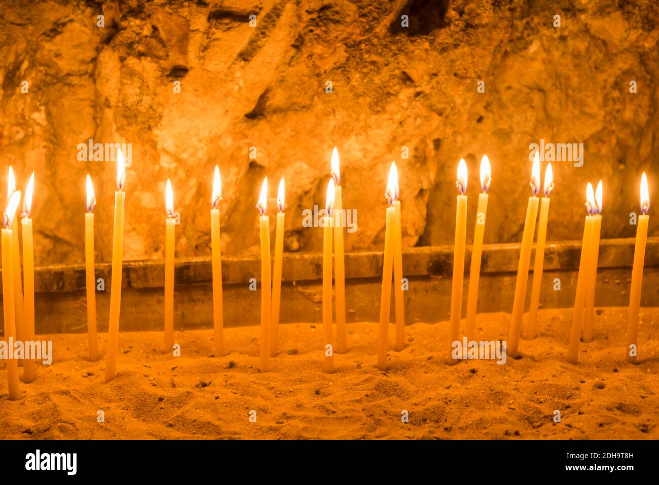 Candles lighting at Prison of Christ. Monastery of the Praetorium. The