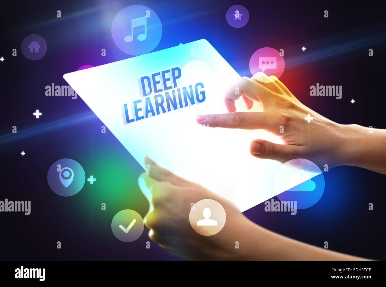 Holding futuristic tablet with DEEP LEARNING inscription, new ...