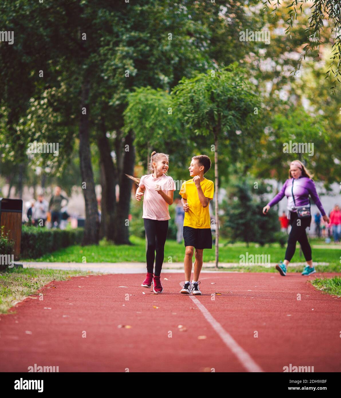 Kids run. Healthy sport. Child sport, heterosexual twins running on