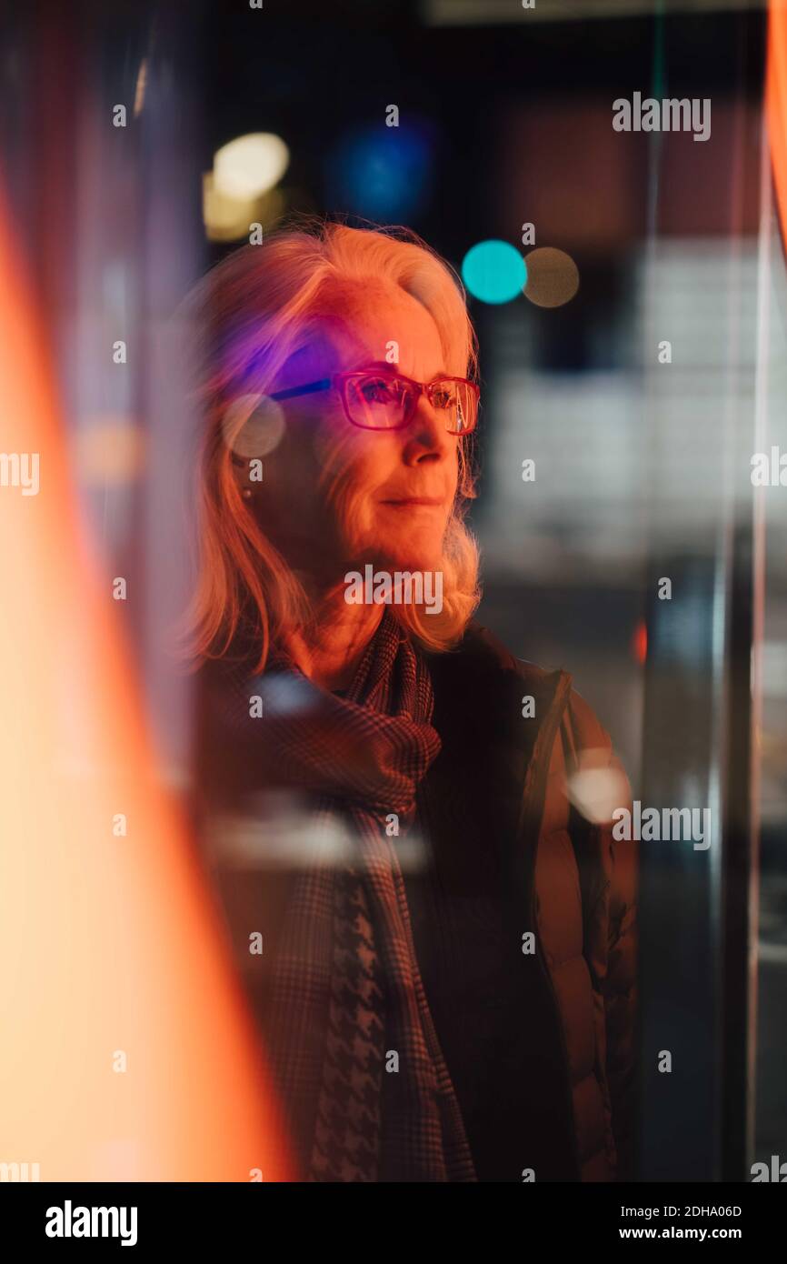 Pensive senior woman in city hi-res stock photography and images - Alamy