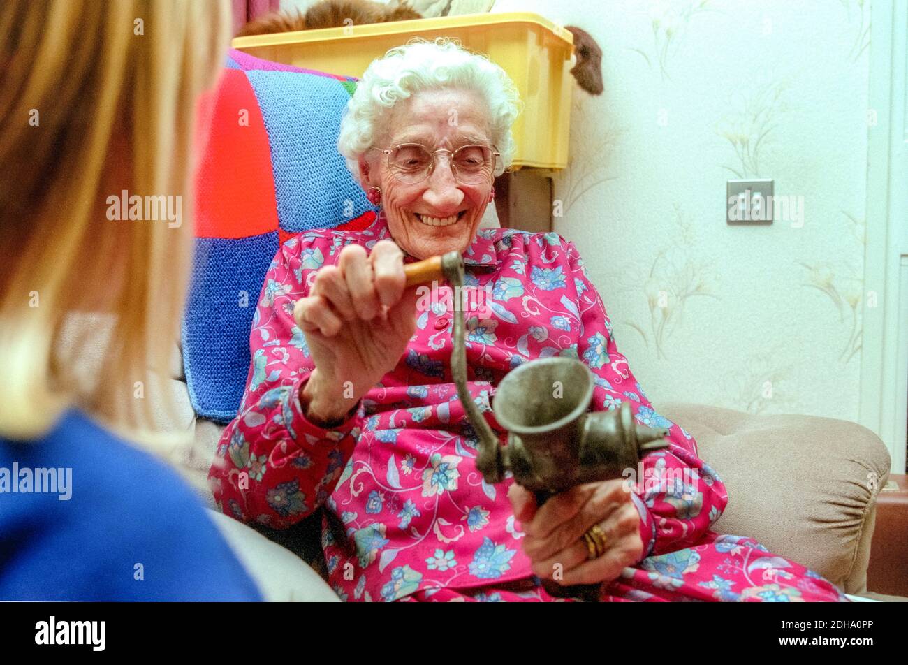 School visit to care home to visit elderly residents and look at memorabilia. UK Stock Photo